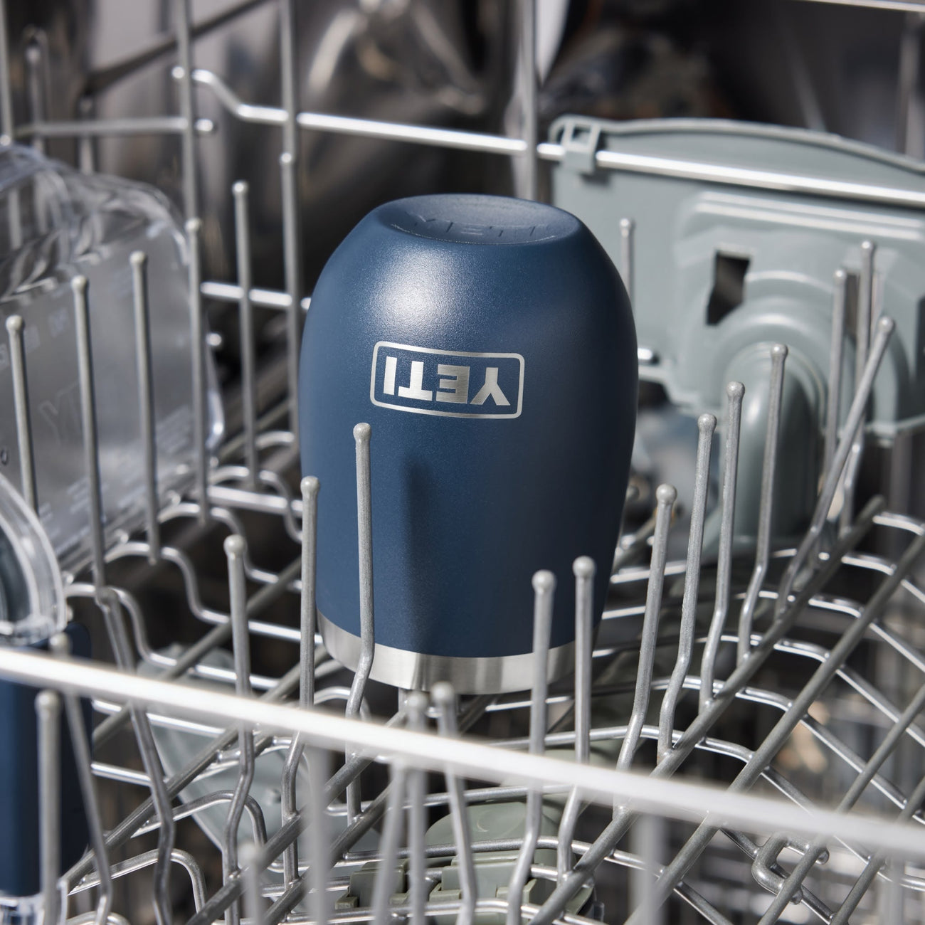 Blue Yetti wine tumbler inside a dishwasher rack
