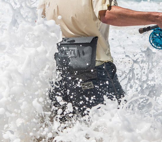 YETI Introduces Impressive Duo: The Sidekick Dry Gear Case and Sideclick  Strap